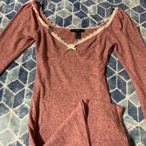 Hello this is a cute pink dress that is up to the knees with a shoulder lay off